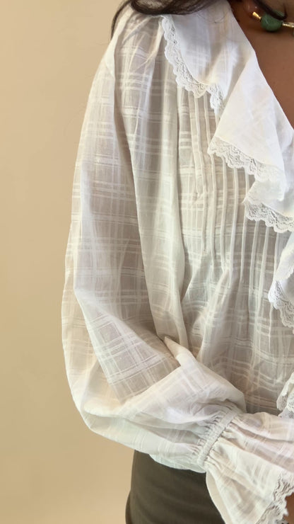 Della Ruffled V-neck Blouse